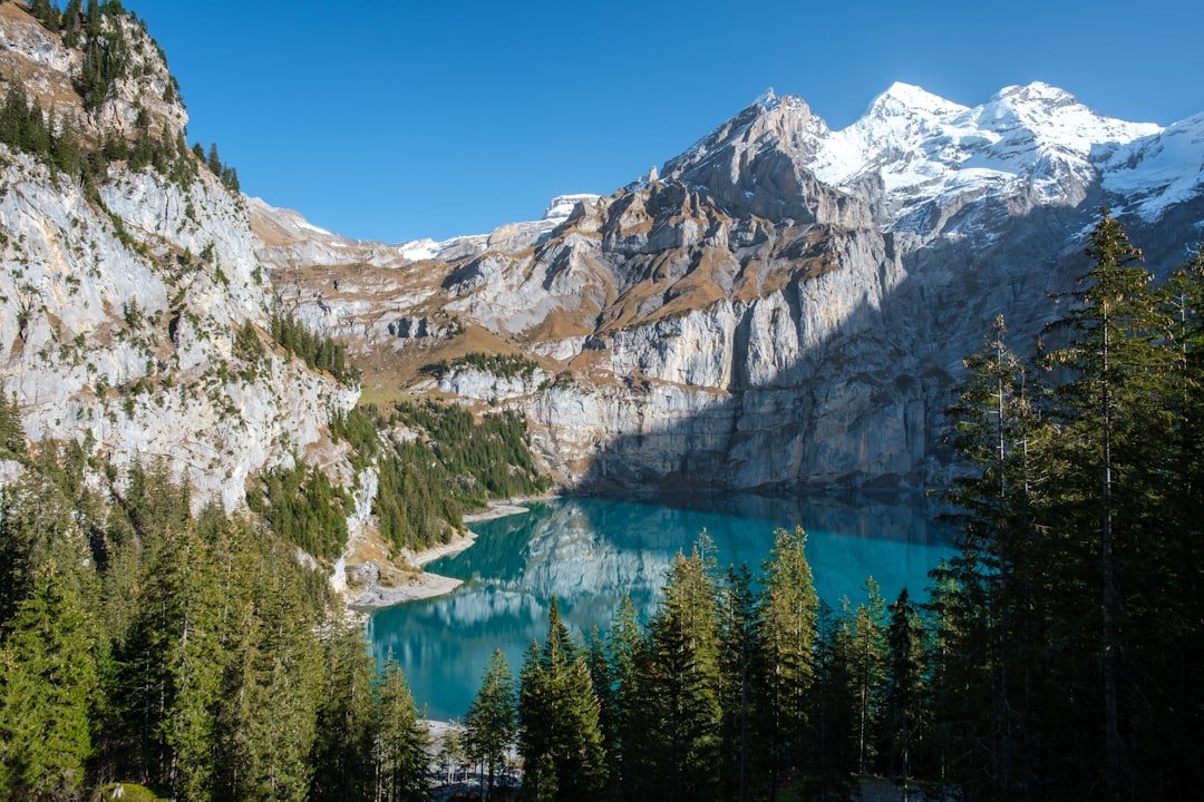 Oeschinen lake turquoise water and cirque peaks